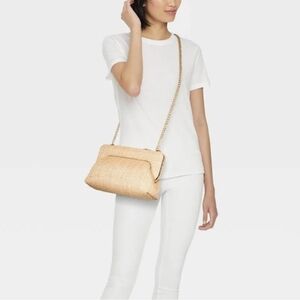 A New Day straw puff clutch in beige with gold chain strap